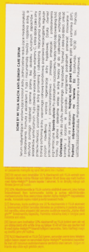 Tył żółtego opakowania serum Some By Mi Yuja Niacin Anti-Blemish Care z polskim opisem składu i działania.