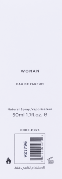 Tył opakowania perfum 'WOMAN EAU DE PARFUM' 50ml Natural Spray. Widoczny kod kreskowy, symbol płomienia i tekst arabski.