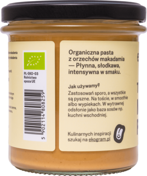 Tył słoika Ekogram BIO pasty z orzechów makadamia, z etykietą, tekstem po polsku i certyfikatem organicznym.