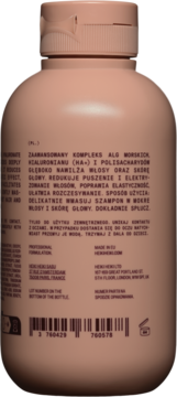 Tył opakowania nawilżającego szamponu Heiki Heiki Moisture. Matowa brzoskwiniowa butelka z białym tekstem w języku polskim.