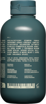 Tył ciemnozielonej butelki szamponu Heiki Anti-Grey, z polskim opisem działania przeciw siwieniu.