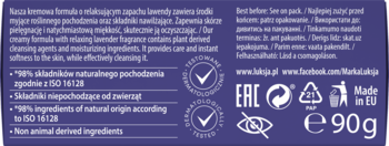 Tył fioletowego opakowania mydła Luksja Deeply Relaxing, z białym tekstem o 98% naturalnych składnikach i wadze 90g.