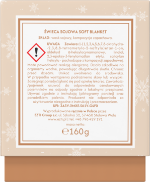 Tył świecy sojowej Soft Blanket 160g, biała etykieta z polskim tekstem o składzie i ostrzeżeniach na tle płatków śniegu.