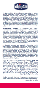 Chicco Baby Moments skrobia ryżowa, zbliżenie na białą etykietę opakowania z niebieskim logo i opisem w wielu językach.