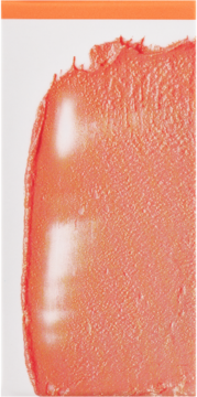 Wielofunkcyjny róż 3w1: cień, pomadka w koralu, zbliżenie na grubą, kremową warstwę z jasnymi refleksami.