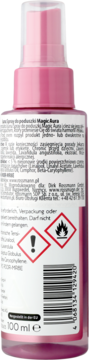Tył różowego sprayu do poduszek Isana Magic Aura 100 ml, z czytelną etykietą i symbolami ostrzegawczymi.