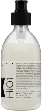 Tył butelki K101, jasny kosmetyk do włosów z czarną pompką, widoczny szczegółowy opis i skład po polsku.