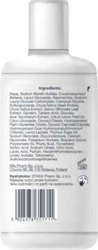 Tył białej butelki szamponu Nizoral Daily Care do włosów przetłuszczających się, ze składnikami i kodem kreskowym.