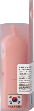 Quret Peach tint/balsam, brzoskwiniowe opakowanie w przezroczystym etui, widoczna flaga Korei, Made in Korea.