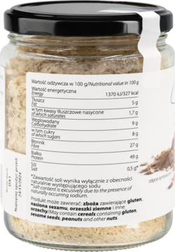 Widok z tyłu szklanego słoika z nieaktywnymi płatkami drożdżowymi, z czytelną etykietą wartości odżywczych.