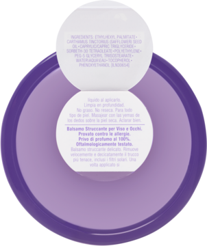 Otwarty fioletowy słoik balsamu do demakijażu twarzy i oczu, widok z góry na wewnętrzne etykiety z opisem.