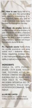 Tył opakowania olejku do paznokci z wielojęzycznymi instrukcjami użycia (EN, ES, PL) i listą składników.