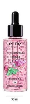 éRNé MICROCAPSULE SERUM, 30 ml, w przezroczystej butelce z czarnym zakraplaczem, różowe mikro kapsułki i kwiaty.