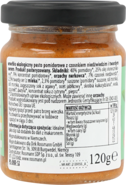 Tył słoika z ekologicznym pesto pomidorowym. Zielona etykieta ze składem i tabelą wartości odżywczych.