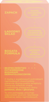 Pomarańczowo-żółty bok opakowania kosmetyku z opisem cech: zapach, łagodny skład, formuła, pantenol, aloes, gliceryna.