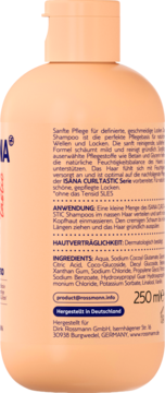 Tył brzoskwiniowej butelki szamponu Isana Curltastic 250ml z niemieckim opisem, składem i danymi producenta.