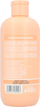 Tył brzoskwiniowego szamponu Hairburst Longer Stronger Hair z listą składników, kodem kreskowym, ikonami social media.