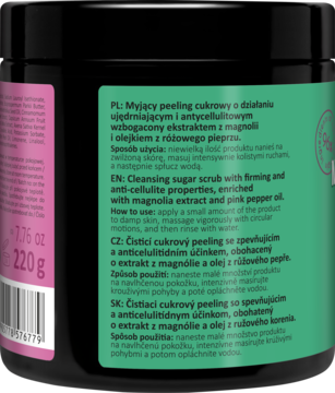 Tył czarnego słoika peelingu cukrowego z magnolią i różowym pieprzem, zielona etykieta z opisem ujędrniającym.