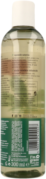 Tył butelki szamponu tołpa 300ml, przezroczysta, z zieloną etykietą i polskim opisem składników.