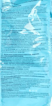 Część jasnoniebieskiego opakowania karmy dla psa Winston Soczyste kąski, widoczne polskie opisy składu.