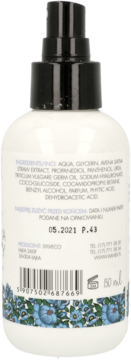 Tył białej butelki nawilżającego toniku-mgiełki z czarnym dozownikiem, widoczne składniki, data ważności 05.2021.