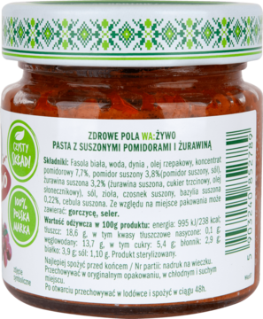 Tył szklanego słoika WA:ŻYWO, czerwona pasta z suszonymi pomidorami i żurawiną, etykieta ze składem.