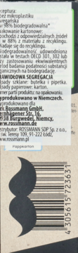 Tył kartonowego opakowania Rossmanna, z tekstem o biodegradowalności i recyklingu, widoczny kod kreskowy.