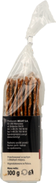 Tył przezroczystego opakowania pieczywa chrupkiego żytniego Melhit z pomidorami i bazylią, masa netto 100g.