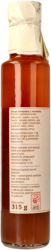 Tył butelki Iskierka Dziadunia syrop korzenny z miodem, z beżową etykietą i tekstem o wadze 315g.