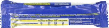 Tył niebieskiego opakowania E. Wedel Chałwy Królewskiej waniliowej, widoczna tabela wartości odżywczych.