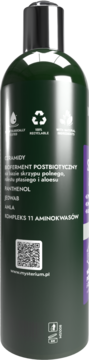 Tył ciemnozielonej butelki wzmacniającego szamponu Mysterium z biotyną, srebrna zakrętka, symbole recyklingu, widoczny kod QR.