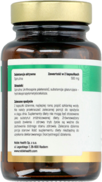 Tylny widok brązowej butelki suplementu Spirulina Noble Health w kapsułkach, z białą etykietą i polskim opisem.