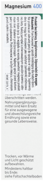 Pionowa etykieta suplementu Magnez 400 z instrukcjami w języku polskim i niemieckim na białym tle.