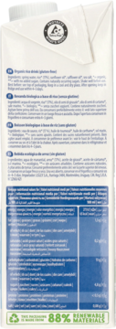 Tył białego opakowania ekologicznego napoju ryżowego bez glutenu, z wielojęzycznymi napisami.