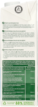 Tył białego kartonu organicznego napoju sojowego (bez glutenu), widoczne zielone etykiety z danymi odżywczymi.