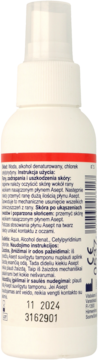 Tylna strona białej butelki sprayu antyseptycznego, z czerwoną linią, widocznym tekstem i datą ważności.