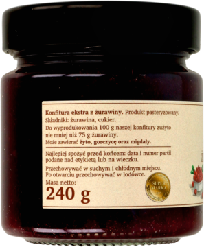 Tył szklanego słoika konfitury ekstra z żurawiny 240g, beżowa etykieta z tekstem i pieczęcią Produkt Polski.