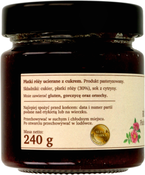 Szklany słoik konfitury różanej 240g, widok z tyłu. Biała etykieta z listą składników i masą netto.