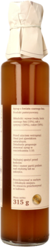 Bursztynowy syrop z czarnego bzu w szklanej butelce z beżową etykietą, widoczne 315g i opis składu, z boku.