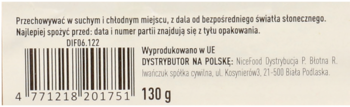 Tył opakowania wegańskich chlebków warzywnych 130g. Widoczny kod kreskowy, dane producenta i dystrybutora.