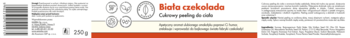Cukrowy peeling do ciała Biała Czekolada. Etykieta, białe tło z pomarańczowym dołem i czerwonym napisem.