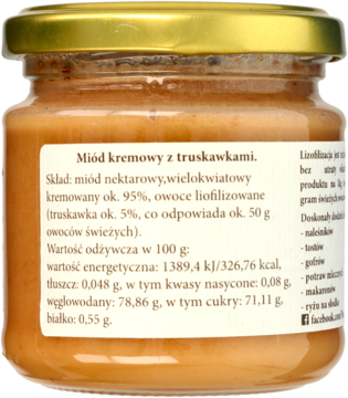 Miód kremowy z truskawkami w szklanym słoiku, widok z tyłu z pełną etykietą składu i wartości odżywczych.