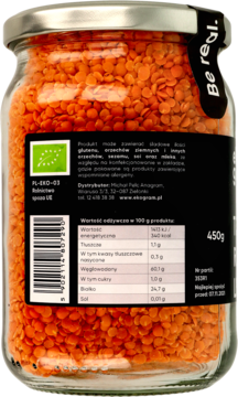 Tył szklanego słoika z organiczną czerwoną soczewicą, 450g. Widoczna etykieta z danymi odżywczymi i BIO logo.
