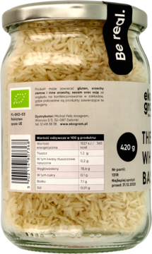 Tył szklanego słoika z białym ryżem basmati BIO, widoczna etykieta z wartościami odżywczymi i masą 420g.
