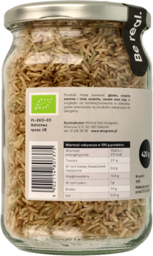 Tył szklanego słoika BIO brązowego ryżu Basmati. Biała etykieta z zielonym logo eko i danymi żywieniowymi, 420g.