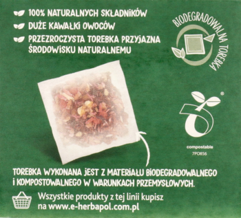 Tył zielonego opakowania Herbapol Herbaciany Ogród Zimowy Sekret. Widać przezroczystą, biodegradowalną torebkę herbaty.