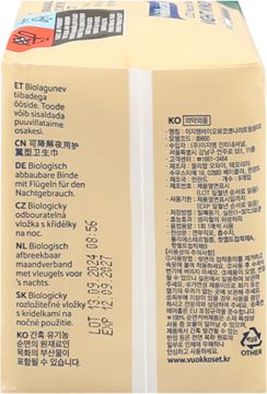 Tył beżowego opakowania podpasek nocnych Vuokkoset Bio, biodegradowalnych, ze skrzydełkami, z opisem produktu w kilku językach.
