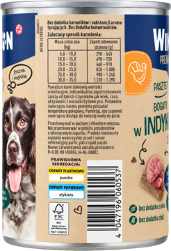 Tył puszki karmy Winston Nature Premium dla psa, bogatej w indyka. Widoczna tabela karmienia i ikony recyklingu.