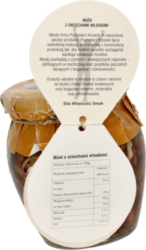 Szklany słoik miodu Pszczelarz Kozacki z orzechami włoskimi, z brązowym wieczkiem i białą etykietą, widok z przodu.