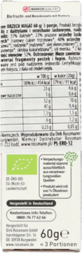 Tył opakowania organicznej przekąski orzechowo-nugatowej, 60g, z tabelą wartości odżywczych i logo BIO.